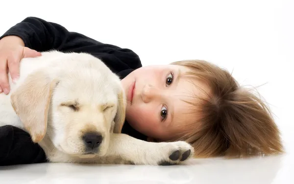 Child with puppy — Stock Photo, Image