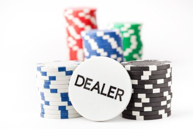 Poker chips and dealer button clipart