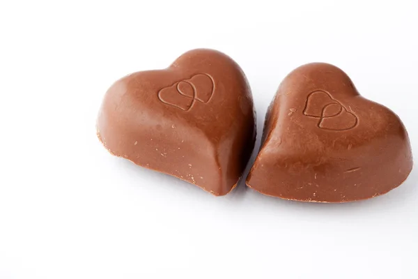 Dvě Lahodné Čokoládové Srdce Pro Den Svatého Valentýna Bílém Pozadí — Stock fotografie