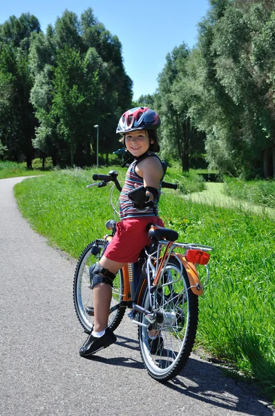 stock image Young boy drive bicycle