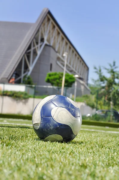 Soccer ball on the grass field — Stock Photo, Image