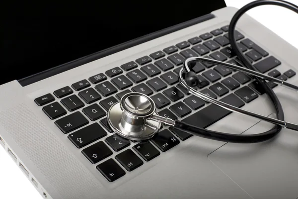 Laptop Mit Medizin Stethoskop Als Symbol — Stockfoto