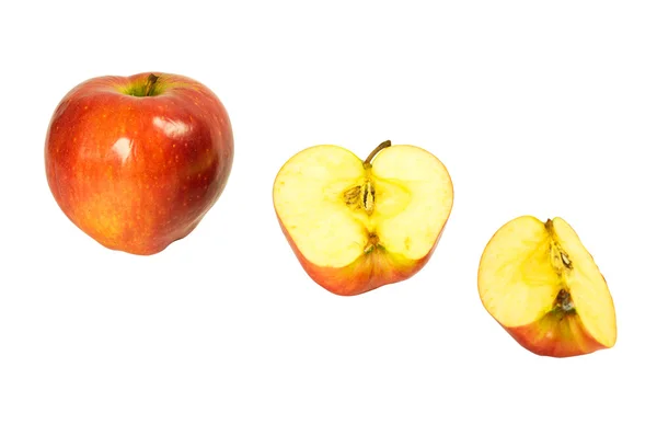 Manzanas enteras y en rodajas Imagen de stock