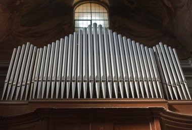 An organ pipe is a sound-producing element of the pipe organ that resonates at a specific pitch when pressurized air clipart