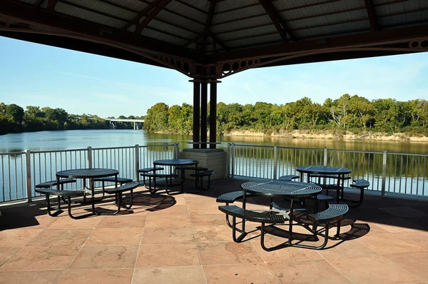 stock image Picnic Tables on Pavilion Overlooking River