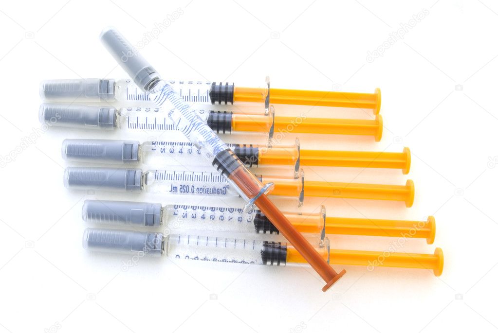 Medicine in syringes isolated by a white background