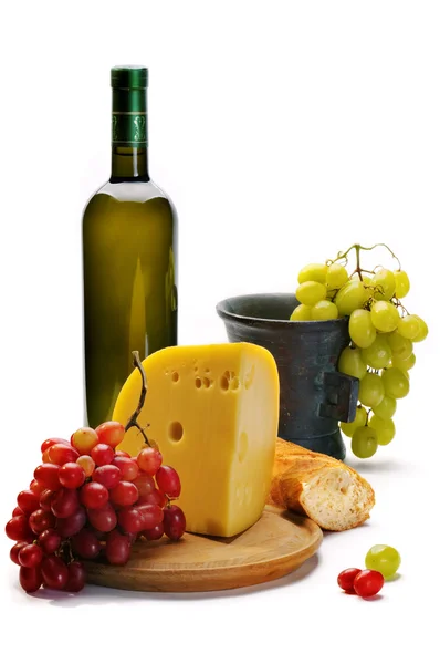 Flasche Weißwein Und Ein Stück Käse lizenzfreie Stockfotos