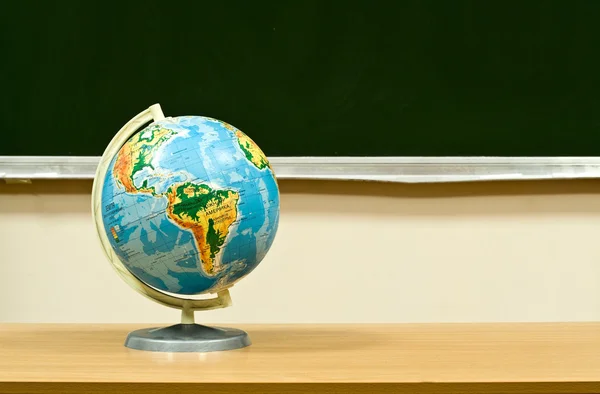 Globe on a table — Stock Photo, Image