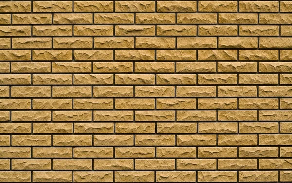 Even yellow, rough brick wall — Stock Photo, Image