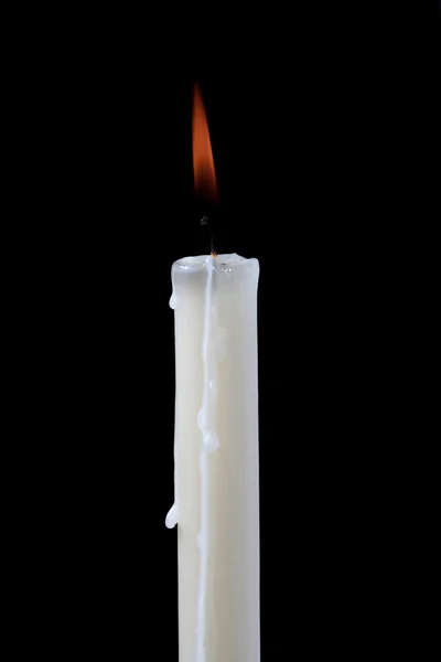 Smoke and extinct candle on a black background — Stock Photo, Image