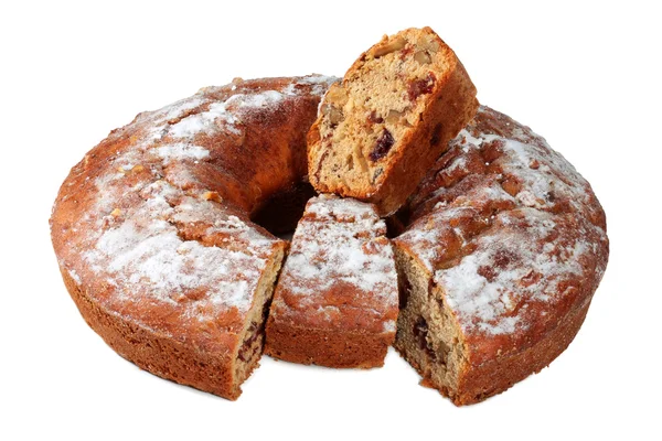 Stock image Cake with nuts, dusted with icing sugar