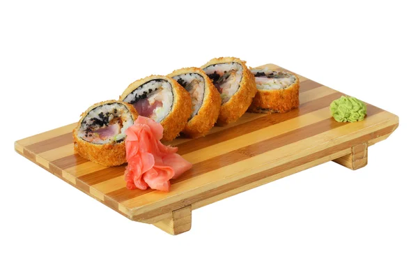 Sushi sur une planche en bois — Photo