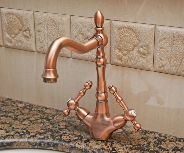 Bathroom tap on a washbasin — Stock Photo, Image