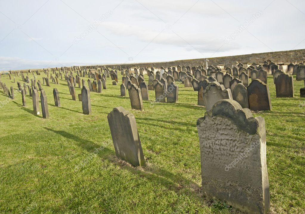 Old church cemetery with headstones