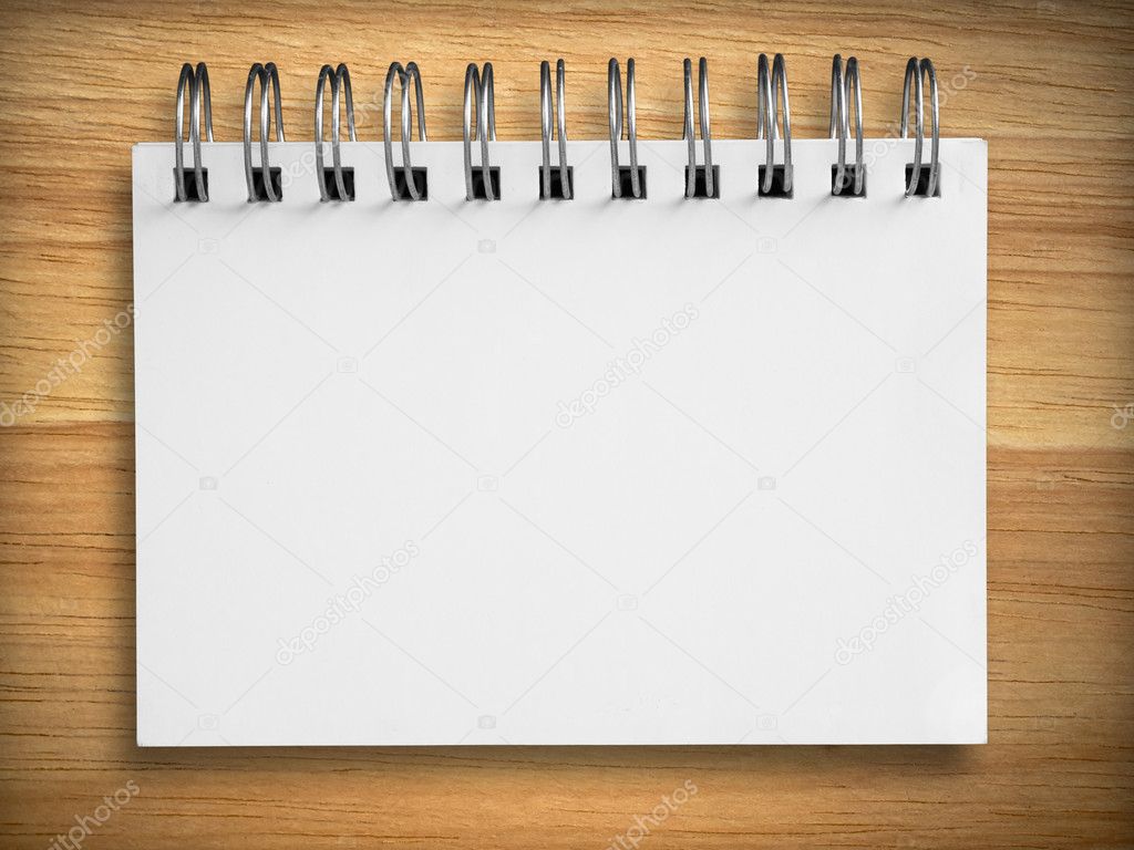 White notebook on Rubber wood