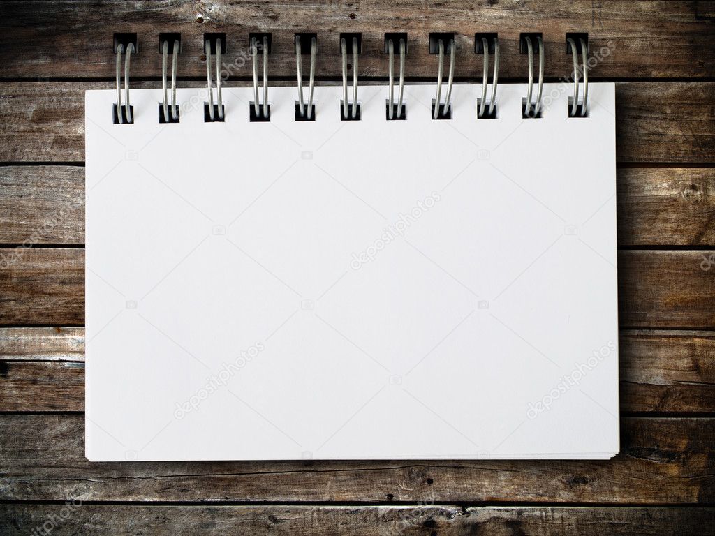 Blank note paper on wood panel