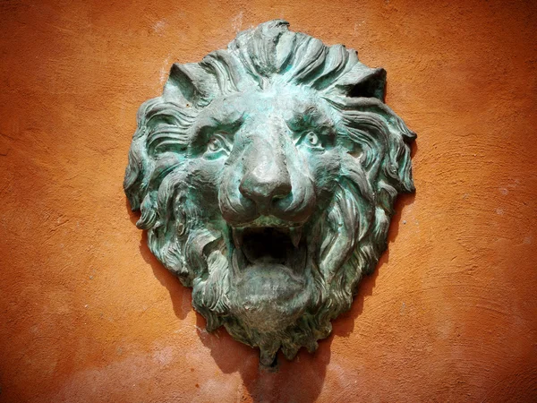 stock image Cast green metal lion head