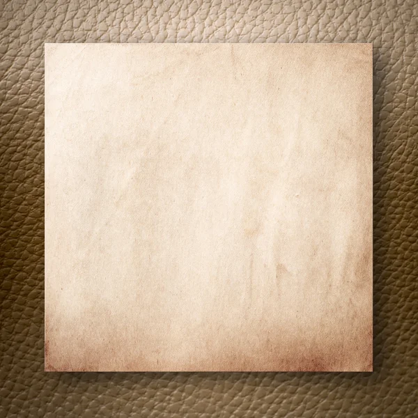 Old Paper On Light Brown Leatherette — Stock Photo, Image
