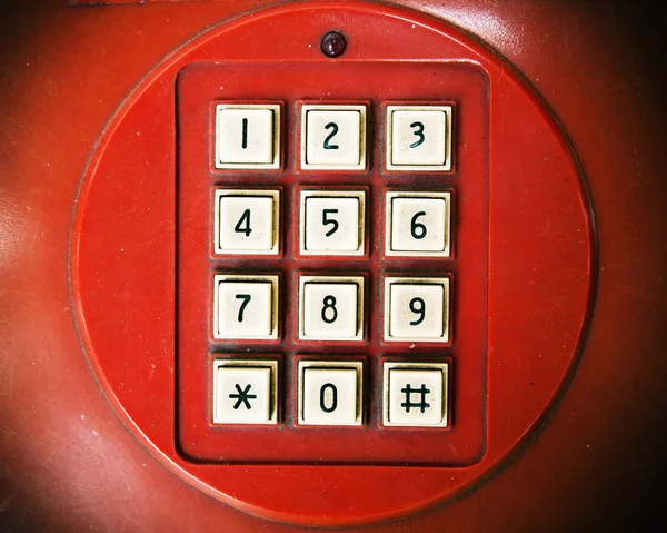 Stary klucz biały telefon — Zdjęcie stockowe