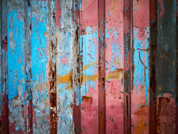 Tinta colorida na parede de metal — Fotografia de Stock