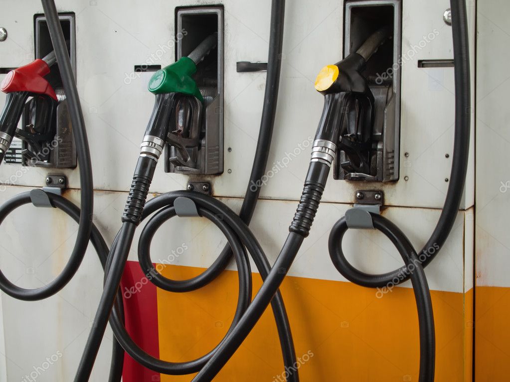 Three Gas Pump Nozzles Stock Photo by ©nuttakit 4170276