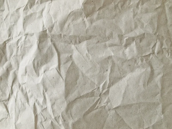 Lekki brązowy zmięty papier — Zdjęcie stockowe