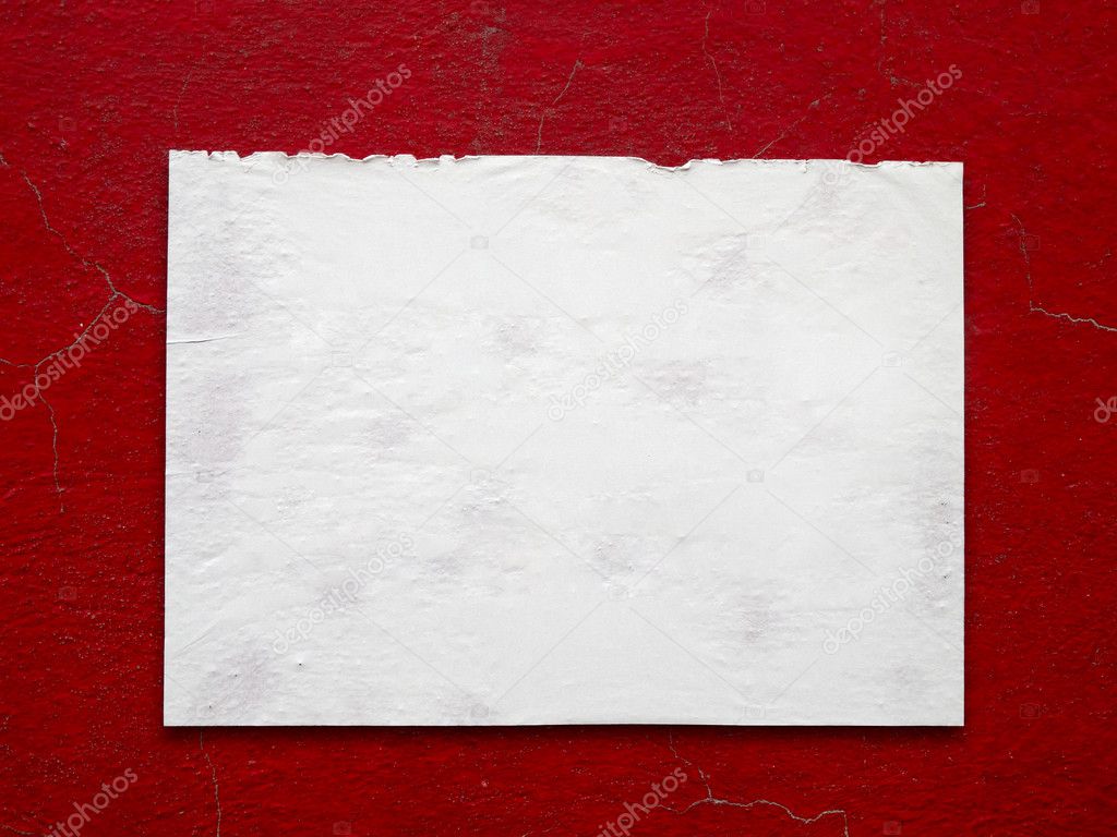 White paper stick on crack old red wall