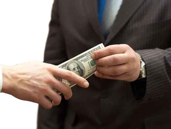 Un uomo consegna soldi a un uomo d'affari — Foto Stock