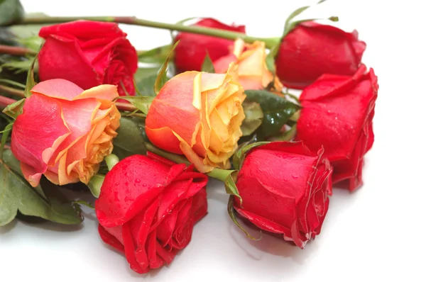 Buquê de rosas vermelhas e amarelas — Fotografia de Stock