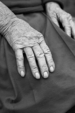 Old woman hands with wrinkled skin clipart