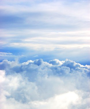 White clouds against blue skies background clipart