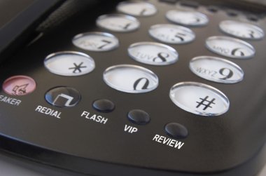 Telephone with focused buttons: vip, review; flash clipart