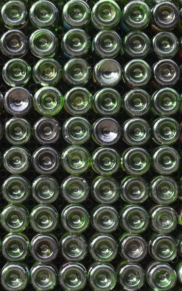 stock image Many green glass wine bottles at winestore