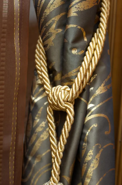 stock image Gold knot on luxury cutrain tassel