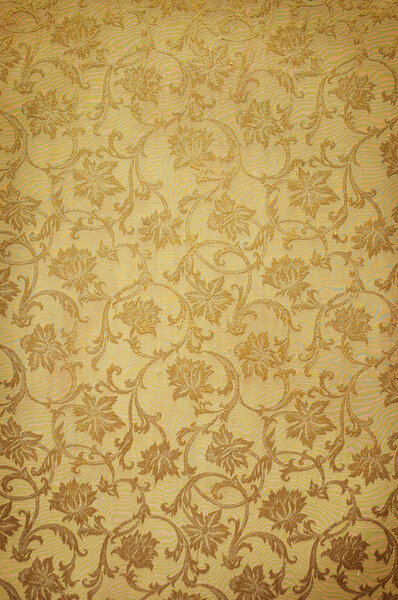 Golden pattern on wallpaper. Ideally as background