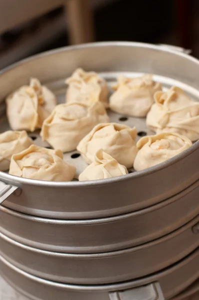 Oriental metall steam cooker with dumplings (manty) — Stock Photo, Image