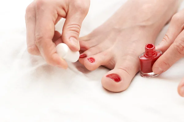 Woman makes pedicure by herself — Stock Photo, Image