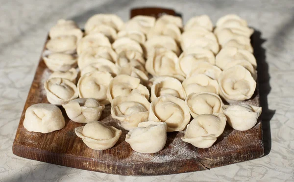 Uncooked meat dumplings — Stock Photo, Image