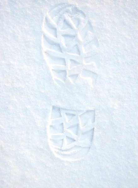 Voetafdruk op schone sneeuw — Stockfoto