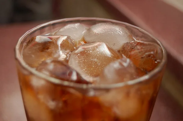 stock image Glass with ice cubes and cocktail