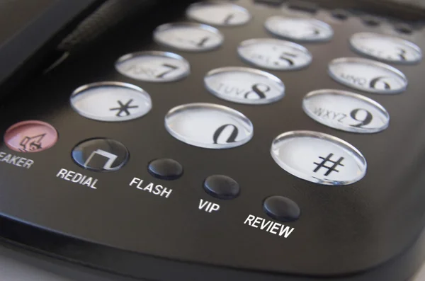 Teléfono con botones enfocados: vip, revisión; flash — Foto de Stock