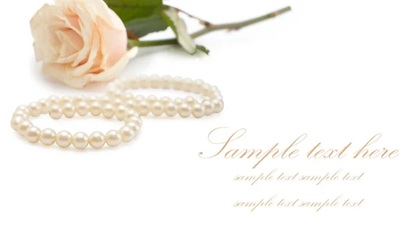 stock image Greeting card with pearls and rose