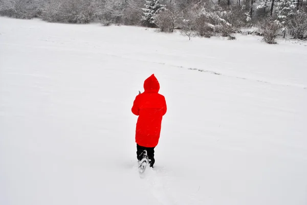 Girl with red coat — Stock Photo, Image