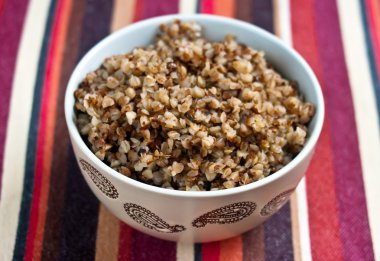 A bowl of boiled buckwheat clipart