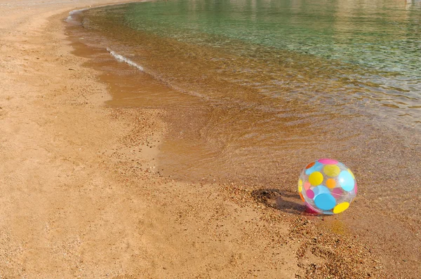 Ball on the huge beach — Stock Photo, Image