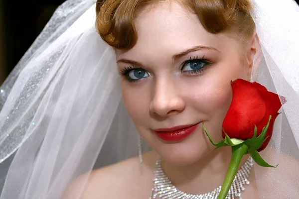 Bride with a rose — Stock Photo, Image