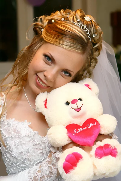 Bride with toy — Stock Photo, Image