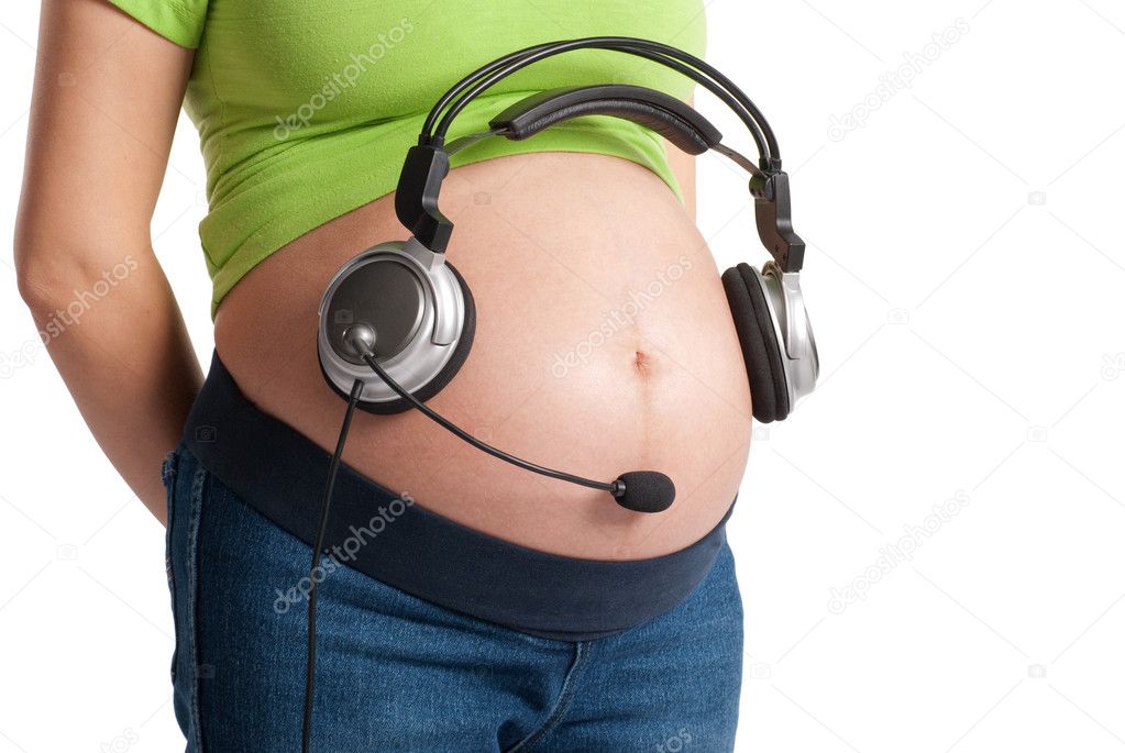 Pregnant belly with headphones Stock Photo by ©bambuh 4120747