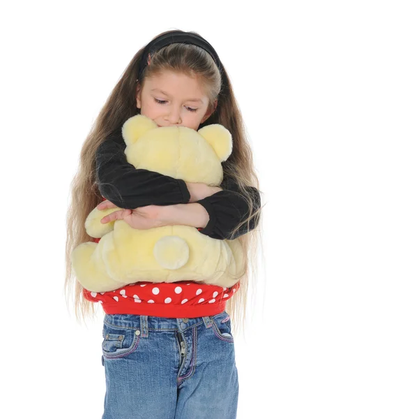 Маленькая девочка с игрушечным медведем — стоковое фото