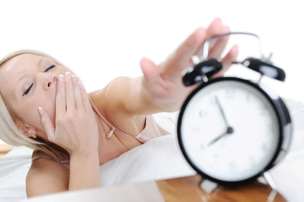 Ospalý žena vypne alarm — Stock fotografie